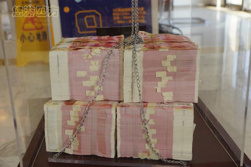 10万人民币现金有多高,8000万人民币现金有多重图文