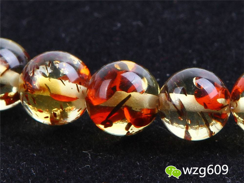 花珀人工爆花能够过检吗,人工爆花的花珀是假的吗