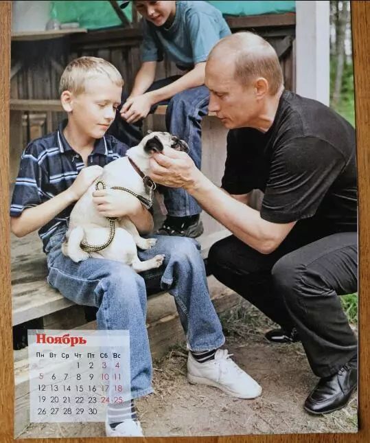 普京日历,普京和狗狗温馨图片