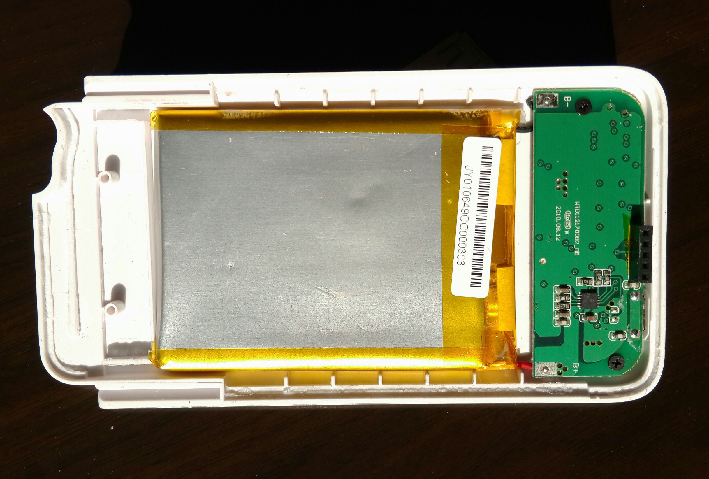 拆解苹果4电池,苹果4电池保护板拆解图