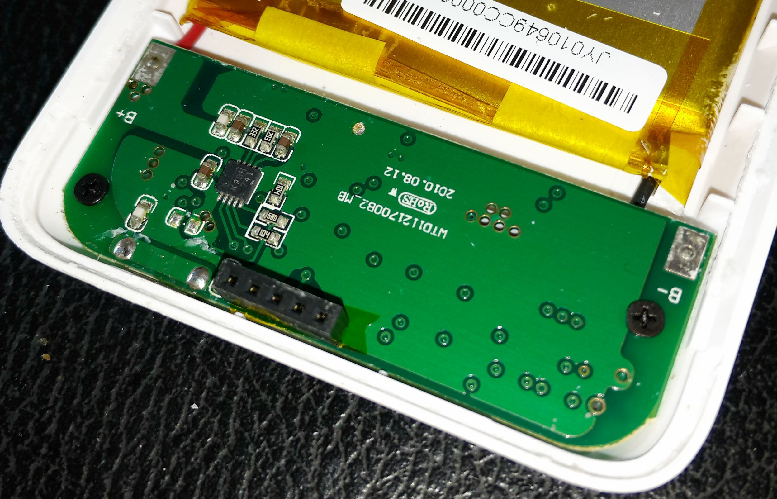 拆解苹果4电池,苹果4电池保护板拆解图