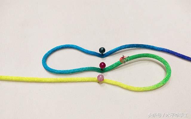 怎样编织酢浆草结的编法图解步骤,手工红绳编织蝴蝶结教程