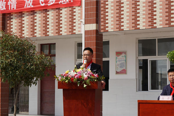 建业集团爱心球场启用仪式在信阳新县举行