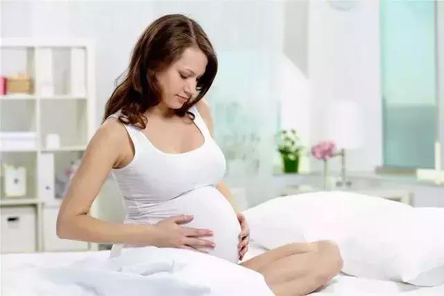 孕期轻微腹痛是怎么回事,孕期腹痛和胎动怎么区分