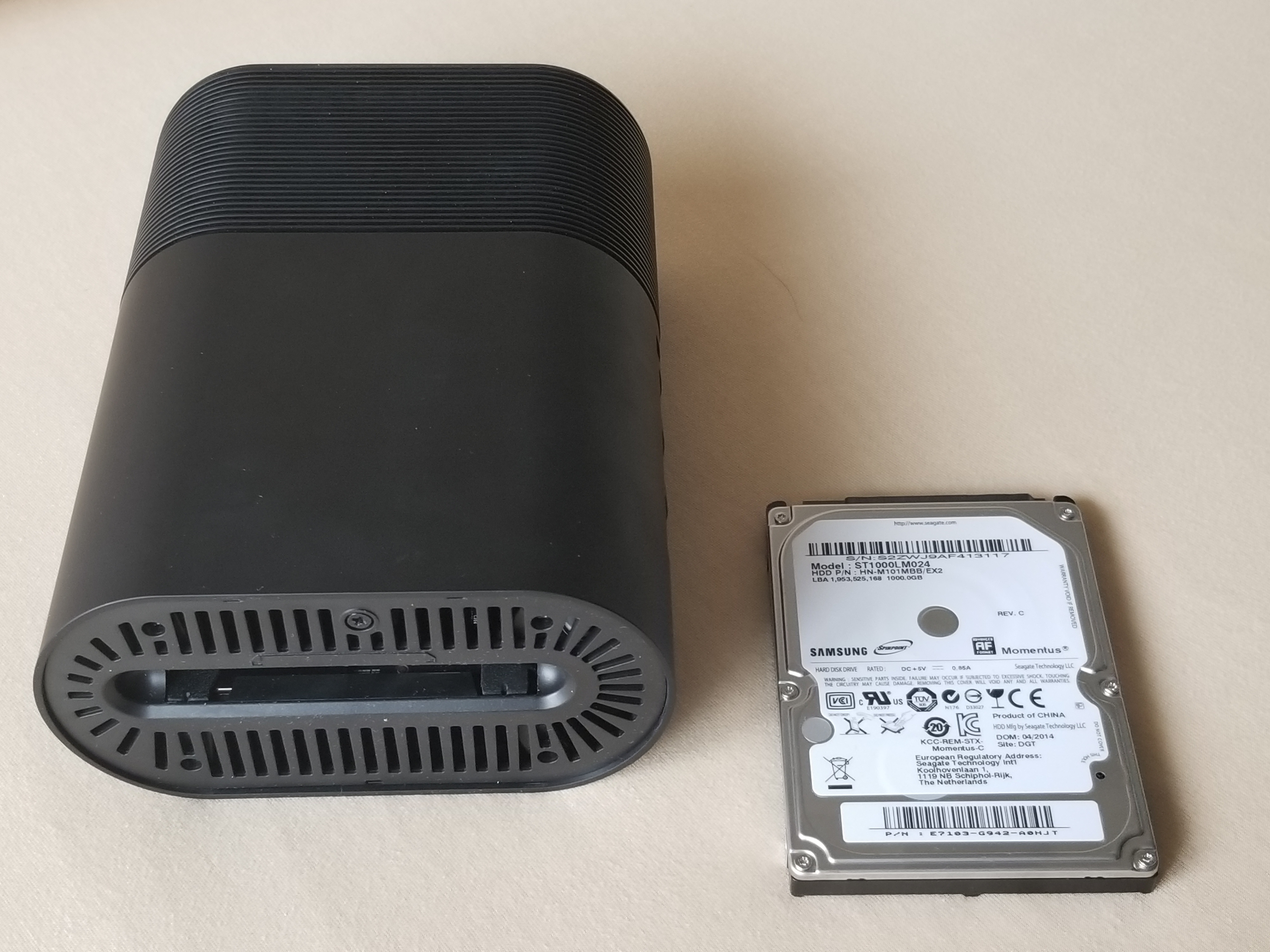 小米路由器r1d拿掉硬盘还能用吗,小米r1d路由器怎么恢复出厂设置